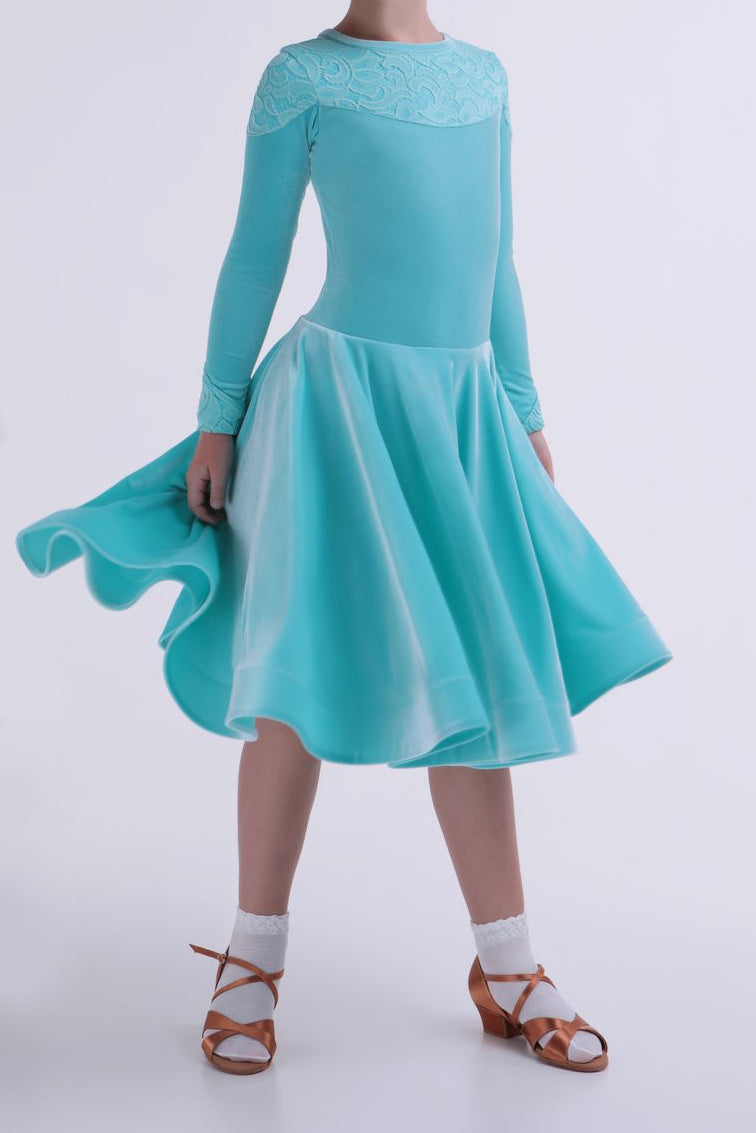 Mint green velour dress with a flowing skirt and long sleeves. Gorgeous dress