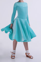 Mint green velour dress with a flowing skirt and long sleeves. Gorgeous dress